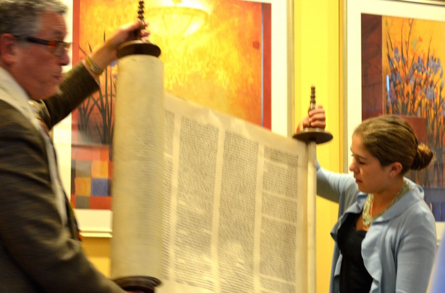 Charlotte Smith and Rabbi Jerry Levy at the dedication of the family Torah scroll rescued by her great-great-grandfather, at AlmaVia, a senior residence community in San Rafael,California, Oct. 2012. (Julie Ann Kodmur)