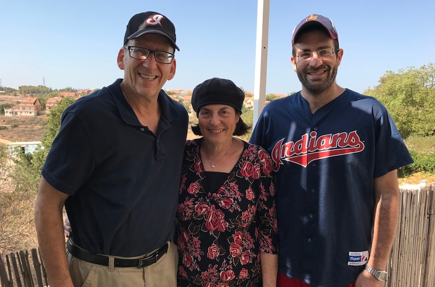 Doug Mandel (left), iris Mandel and Mitch Mandel posing at their house in the West Bank settlement of Karnei Shomron, Oct. 28, 2016. (Andrew Tobin)