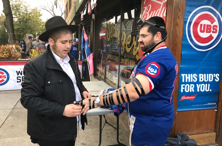 Max Tolsky with a member of the Chabad movement outside Wrigley. (Molly Tolsky)