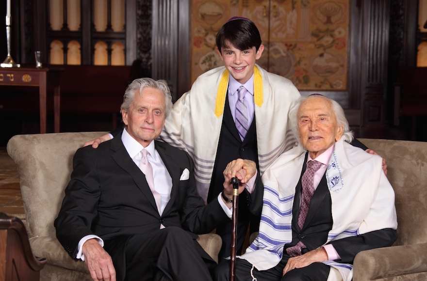 Kirk Douglas, right, with son Michael and grandson Dylan at Dylan's bar mitzvah, May 2014. (Infinity Kornfeld Studios)