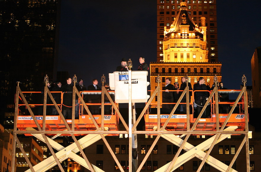 The World's Largest Hanukah Menorah being lighted by then-New York City Mayor Michael R. Bloomberg with Rabbi Shmuel M. Butman, Director of the Lubavitch Youth Organization, in 2013. (PR Newswire)