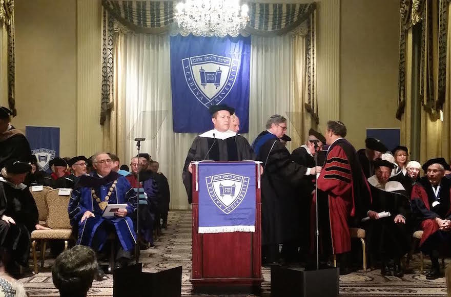 Jerusalem Mayor Nir Barkat delivering the convocation after receiving an honorary degree from Yeshiva University at the Waldorf Astoria in New York City, Dec. 11, 2016. (Courtesy of the City of Jerusalem)