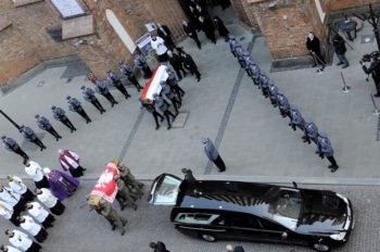 Polish President Lech Kaczynski and his wife, Maria, were laid to rest after funeral services at St. John's Cathedral in Warsaw, April 18, 2010. (Andrzej Rybczynski / AFP / Getty Images)
