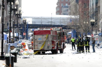 Firefighters taking over the scene of the bombing near the Boston Marathon finish line, April 15, 2013. (Darren McCollester/Getty)