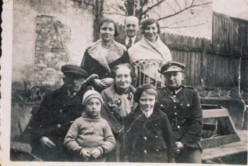 The family of Arnold Greenfeld, Hava Shilo's father, is shown in this 1932 image taken next to their home in Lvov. All eight people were killed in the Holocaust. (Courtesy Hava Shilo)