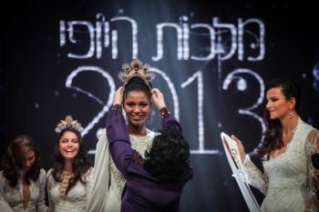 Yityish Aynaw, a 21-year-old Ethiopian-Israeli, being crowned as Miss Israel, Feb. 27, 2013. (Avishag Shar Yashuv/Flash90)