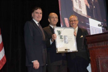 Former Israeli Prime Minister Ehud Olmert is flanked by Seymour Reich, left, and Marvin Lender at the 2005 Israel Policy Forum annual dinner. (Courtesy IPF)