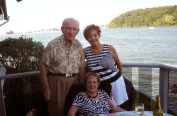 Simon Braitman, left, and his wife, Josephine, hosted Terry Juksch, sitting, and her husband on the latter’s 2010 visit to Rochester, N.Y. (Courtesy William Juksch)