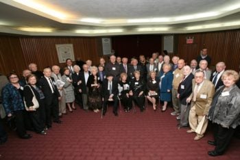 Partisans posing at a reception at Manhattan's Park East Synagogue launching a 24-hour celebration of their World War II heroism, Nov. 6, 2011. (Courtesy of Jewish Partisan Educational Foundation)