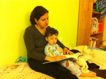 Dasee Berkowitz practicing her reading and storytelling skills with son Tamir. (Courtesy Dasee Berkowitz)