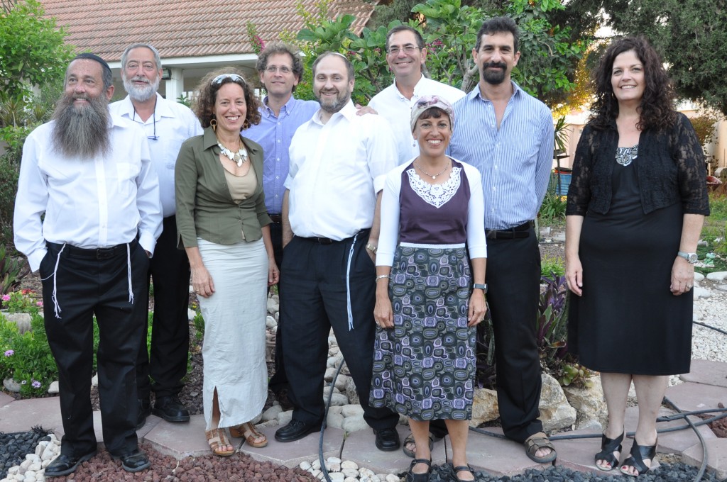 JTA PHOTO: Seeking Kin: From Queens to kibbutz, a 40-year journey Nine members of the Yeshiva of Central Queens’ Class of 1973 reuniting on Kibbutz Ein Hanatziv in Israel, July 5, 2013. They are, from left, Sammy Klein, Yerachmiel Elyashiv, Aviva Gewirtz Lavi, Elliot Cohen, Shaul Sladowsky, host Howie Perlman, Rivki Denberg Bar-Lev, Joel Greenwald and Frema Kuper. (Courtesy Howie Perlman)