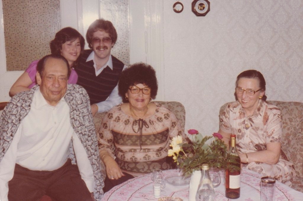 At their Berlin home in 1980, Mohamad and Emmi Helmy flank Anna Gutman; Carla Greenspan and her husband, Barry, appear behind them. (Courtesy Carla Greenspan)  