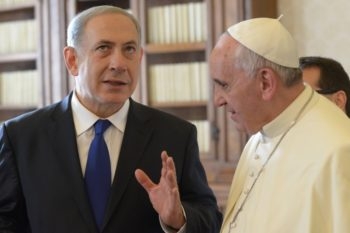 Israeli Prime Minister Benjamin Netanyahu talks with Pope Francis during their meeting at the Vatican, Dec. 2, 2013. (Amos Ben Gershom/GPO/Flash90)