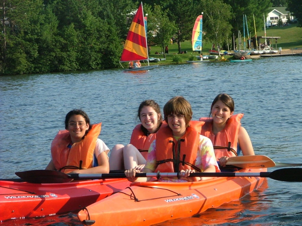 Children with disabilities and their peers kayak at Camp Ramah Wisconsin. (Courtesy National Ramah Commission)