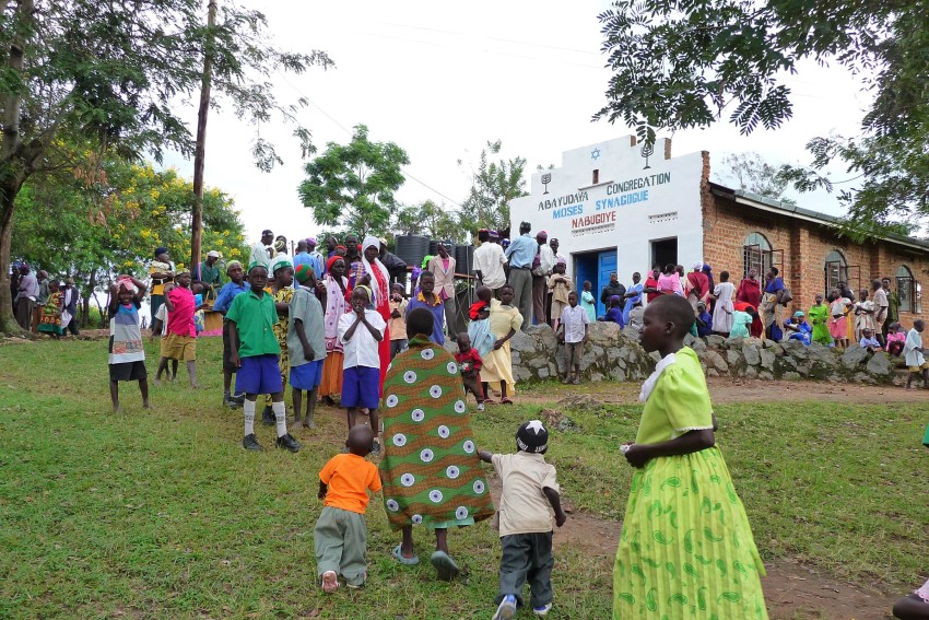 Members of Uganda's Abayudaya Jewish community outside a synagogue in Nabagoye. (Courtesy of Be’chol Lashon)