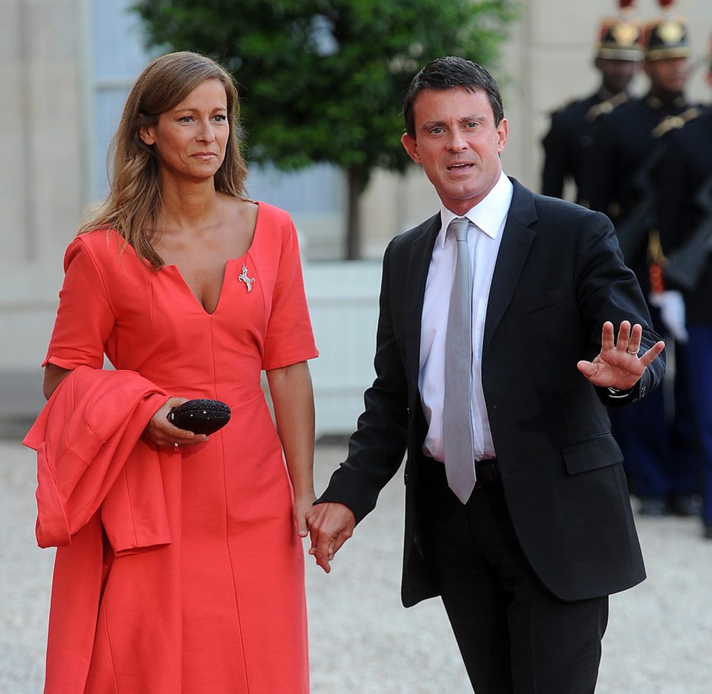Manuel Valls, the the French interior minister, arrives at a state dinner with his wife Anne Gravoin, Sept. 3, 2013. (Antoine Antoniol/Getty Images) 