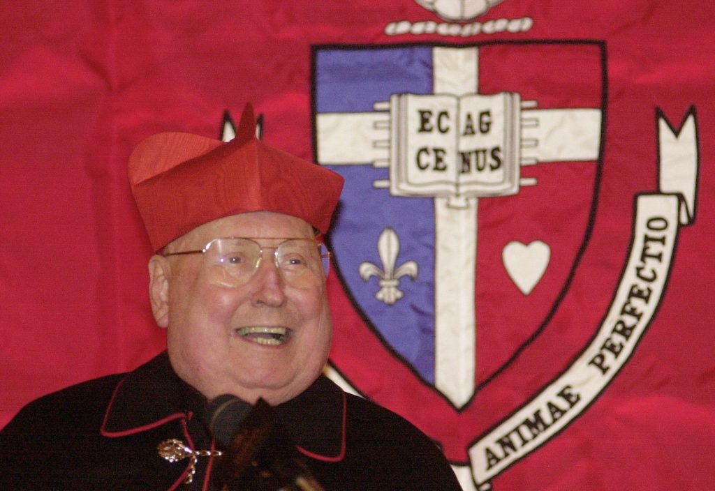 Archbishop of New York Cardinal John O'Connor smiles at a luncheon for St. John's University alumni 13 years after his rare run-in with the Jewish community. (Chris Hondros/Getty Images)