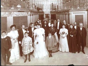 This early 20th-century assemblage in the interior of the S. Jarmulowsky Bank on Manhattan’s Lower East Side could include relatives of Washington resident Michael Herman. (Courtesy Museum at Eldridge Street)