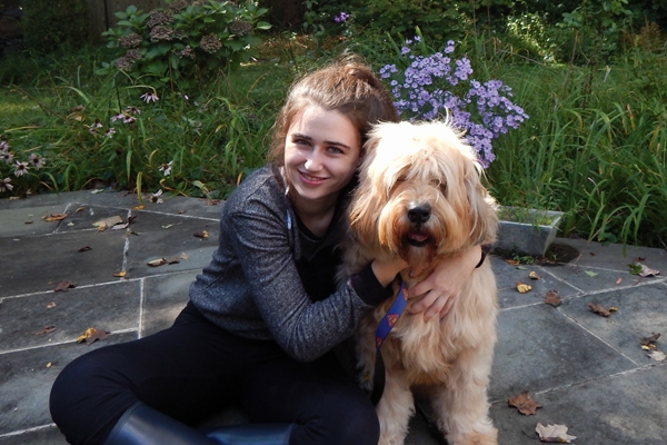 Annie Blumenfeld poses with Teddy, her furry inspiration. (Courtesy Annie Blumenfeld)