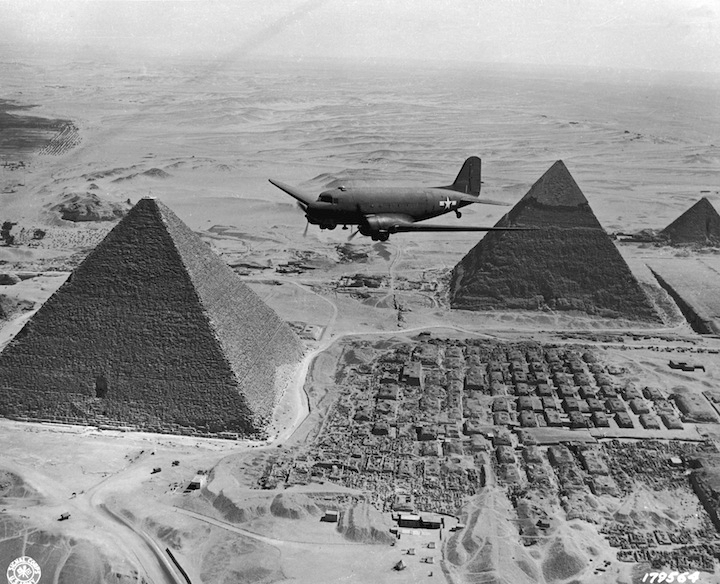 A U.S. Army transport plane flies over the pyramids in Egypt in 1943. (Keystone/Getty Images)