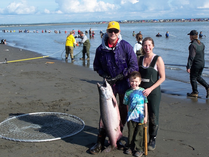 Stewart, Liam and Karen Ferguson (left to right), who are making aliyah, holding a large king salmon that they caught in Alaska. (Courtesy of Stewart Ferguson)