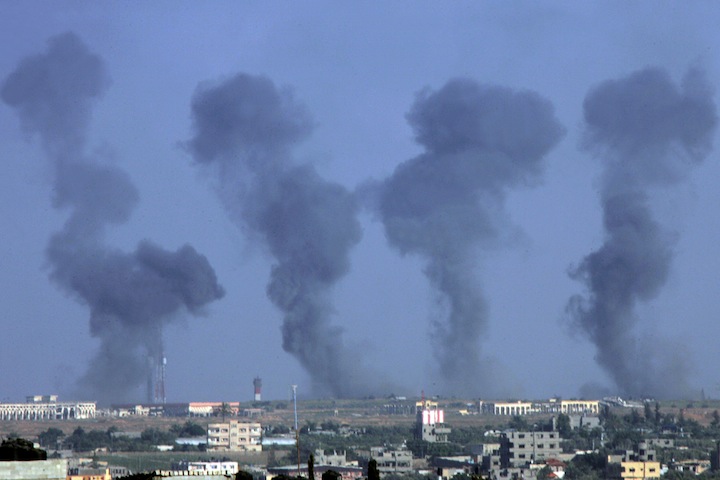 Black smoke rising following an Israeli air strike on the Gaza International Airport in Rafah, July 7, 2014. (Abed Rahim Khatib/Flash 90)