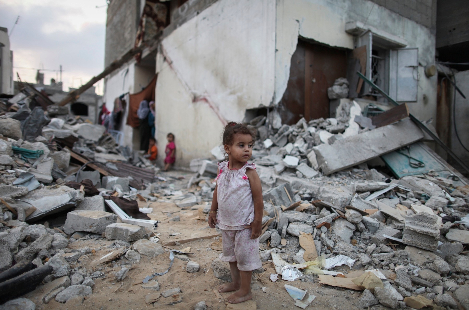 A Palestinian child amid the rubble of homes destroyed by Israeli airstrikes in the northern Gaza Strip, Aug. 18, 2014. (Emad Nasser/Flash90) 