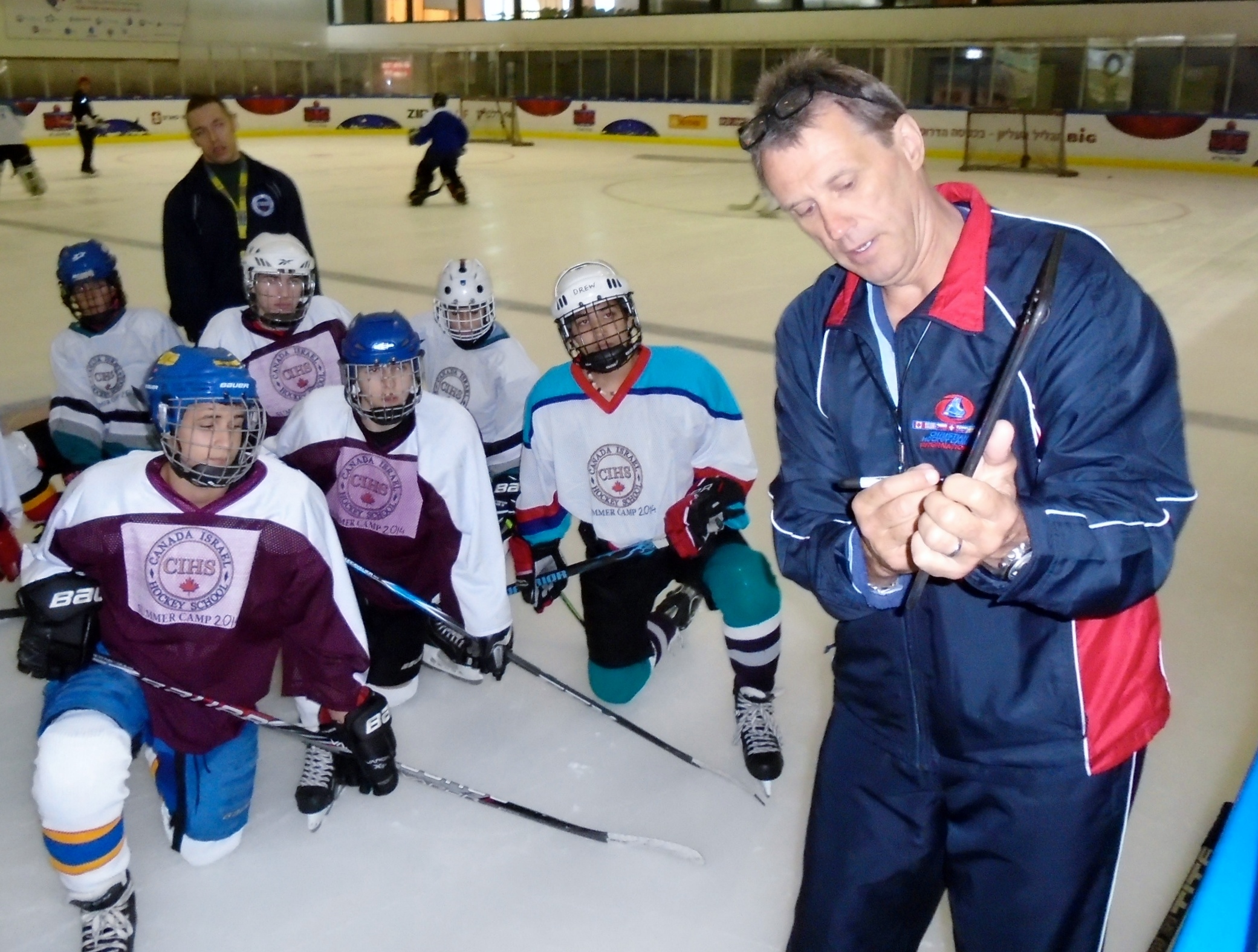 Ex-NHLer Laurie Boschman instructing young Israeli hockey players at the Canada Centre in Metulla, July 2014. (Courtesy Laurie Boschman)