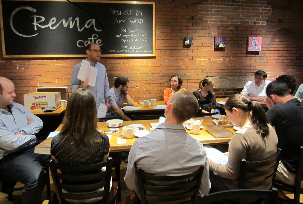 Rabbi Matthew Soffer, director of the Riverway Project, leads a Torah discussion at a Riverway Cafe gathering in Cambridge, Mass., May 2014. (Courtesy Riverway Project)