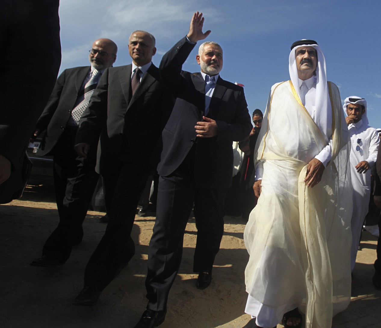 The emir of Qatar, Sheik Hamad bin Khalifa al-Thani, right, with Hamas Prime Minister Ismail Haniyeh, second from right, during an official visit to the Gaza Strip, Oct. 23, 2012. (Mohammed Salem-Pool/Getty Images)