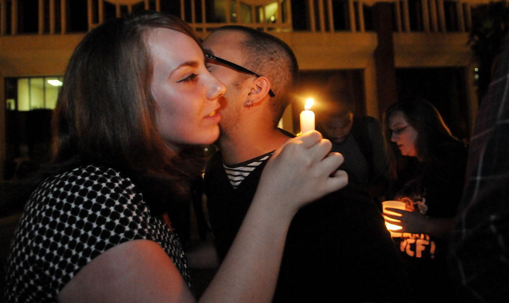 University of Central Florida student Melissa Catalanotto (L) , president of the UCF Society of Professional Journalists, attends a candle light vigil held for journalist Stephen Sotloff on Sept. 3, 2014 at the University of Central Florida in Orlando, Florida. (Gerardo Mora/Getty Images)