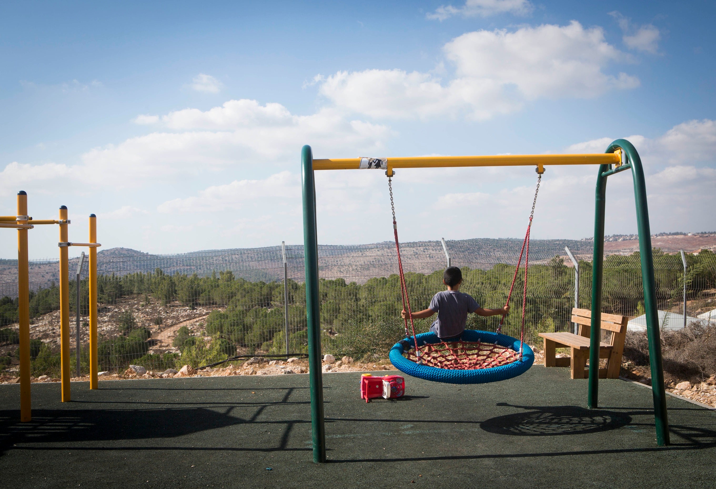 Children seen playing in the streets of the settlement of 