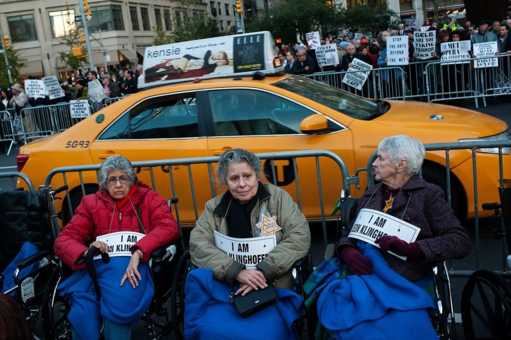Protesters sit in wheelchairs outside the Metropolitan Opera at Lincoln Center on opening night of the opera,
