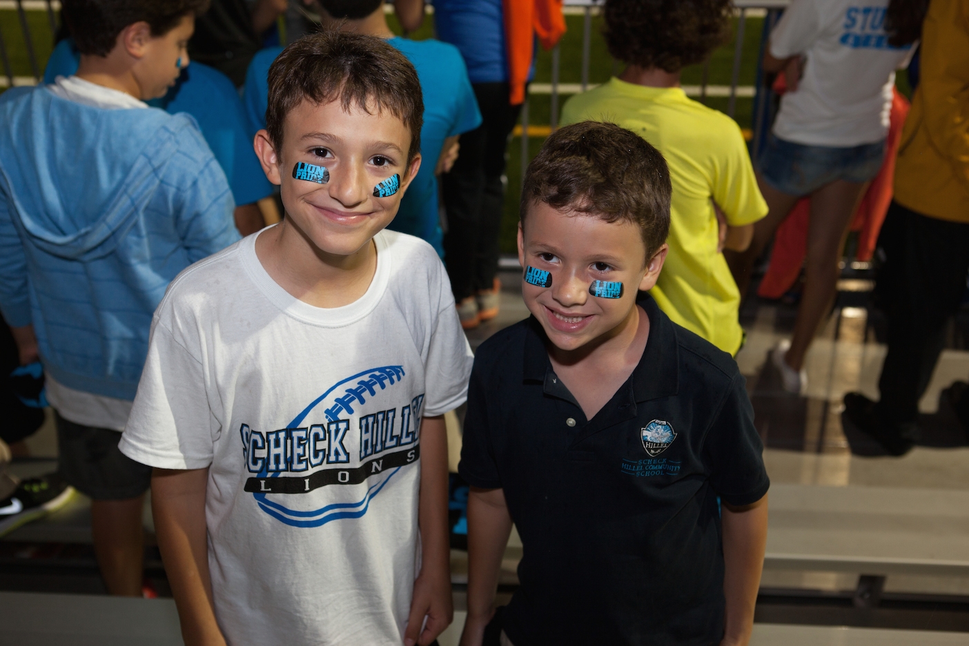 Students at Scheck Hillel Community Day School's homecoming football game, when its new synthetic field made its debut, Oct. 22, 2014. (Courtesy Scheck Hillel)