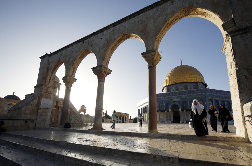 Muslims seen at the Al-Aqsa Mosque, in Jerusalem's Old City, on their way to pray on the second day of the holy Muslim month of Ramadan, June 30, 2014. (Sliman Khader/Flash90) 