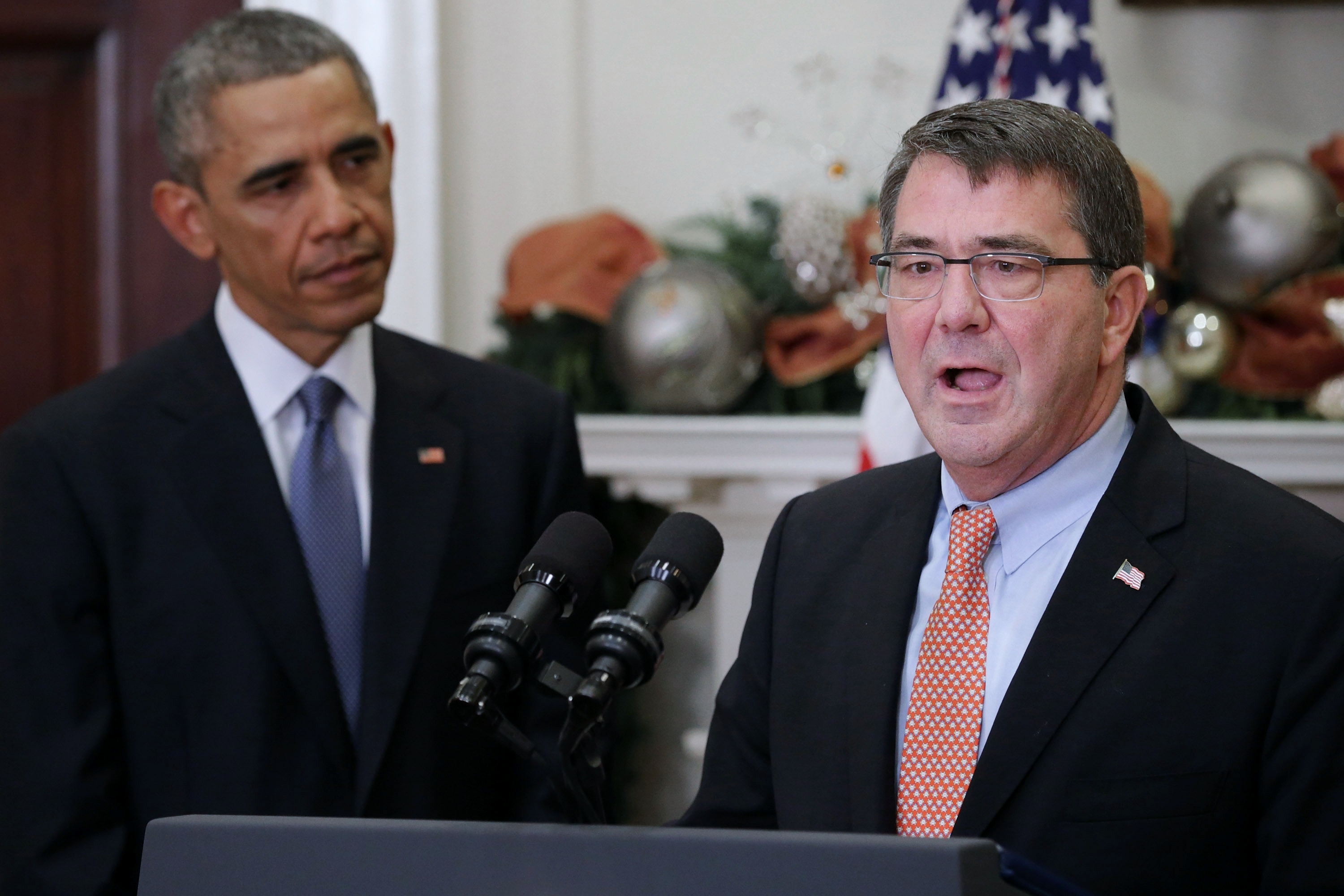 Ashton Carter, at podium, delivering remarks in the White House after being nominated by President Obama to be the next defense secretary, Dec. 5, 2014. (Chip Somodevilla/Getty Images)