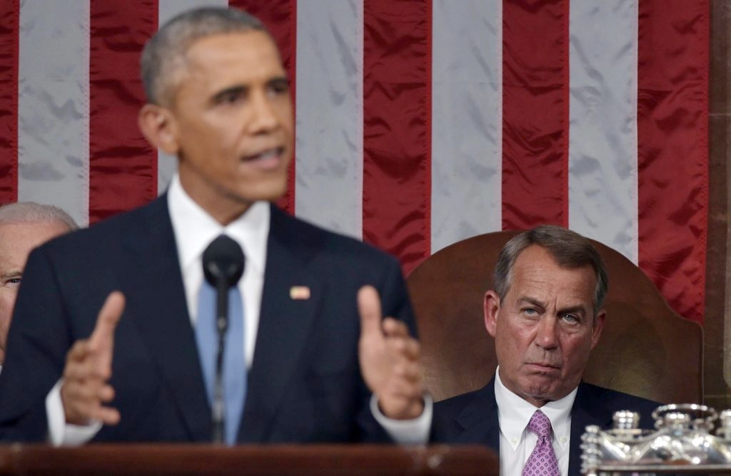 President Obama delivering his State of the Union address on Jan. 20, during which he promised to veto new Iran sanctions legislation. (Mandel Ngan-Pool/Getty Images)