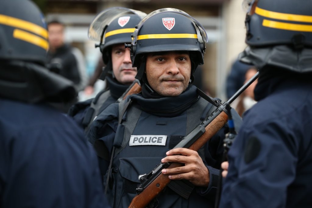 Police arrive with guns at Port de Vincennes on Jan. 9, 2015 in Paris. According to reports at least five people have been taken hostage in a kosher deli in the Port de Vincennes area of Paris. (Dan Kitwood/Getty Images)