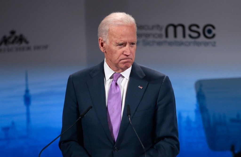 Vice President Joe Biden, shown speaking at a security conference in Germany Feb. 7, announced he would not attend Prime Minister Benjamin Netanyahu's March 3 address to Congress. (Johannes Simon/Getty Images)