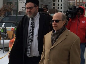 Rabbi Barry Freundel, left, with his lawyer, Jeffrey Harris, outside the courthouse where he pleaded guilty to 52 misdemeanor counts of voyeurism for spying on women at his Orthodox synagogue's mikvah, Feb. 19, 2015. (Dmitriy Shapiro / Washington Jewish Week)