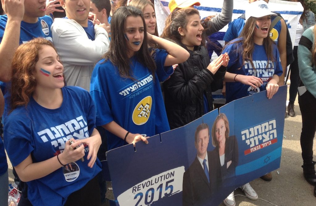 Students at Blich High School celebrating the victory of the center-left Zionist Union in the school's mock elections, Feb. 22, 2015. (Ben Sales)