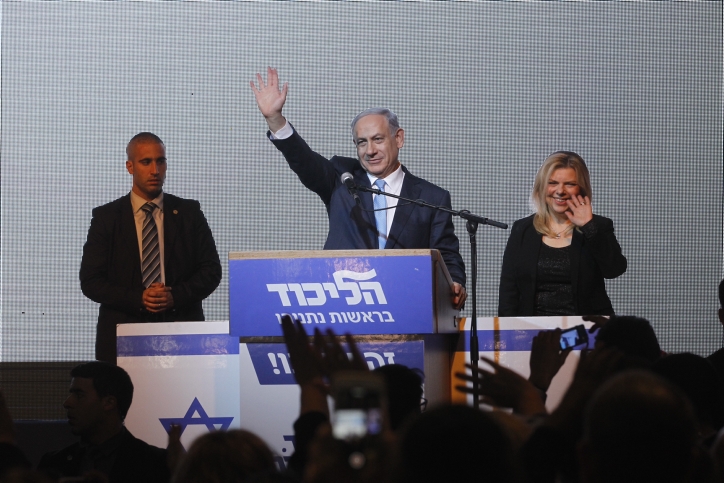 Benjamin Netanyahu celebrates on Election Day as unofficial results show his Likud Party with 27 or 28 seats in Israel's Knesset, March 17, 2015. (Miriam Alster/Flash90)