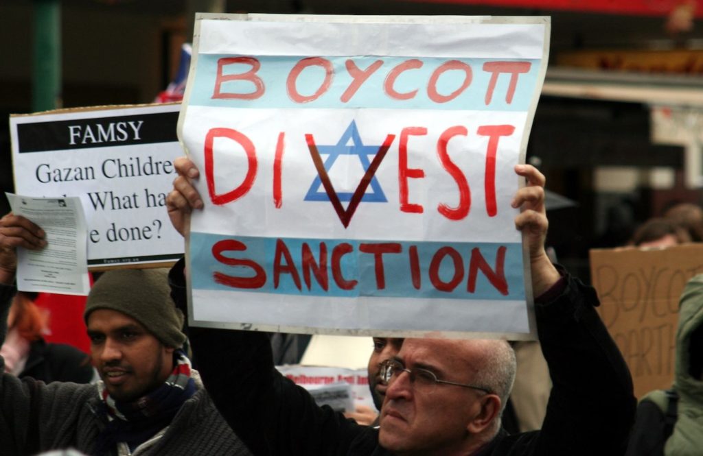 Protesters urging sanctions against Israel at a rally in Melbourne, Australia, June 5, 2010. (Wikimedia Commons)