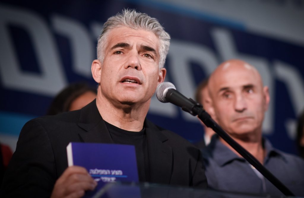 Yair Lapid presenting his Yesh Atid party's platform at a press conference in Tel Aviv, March 2, 2015. (Ben Kelmer/FLASH90)