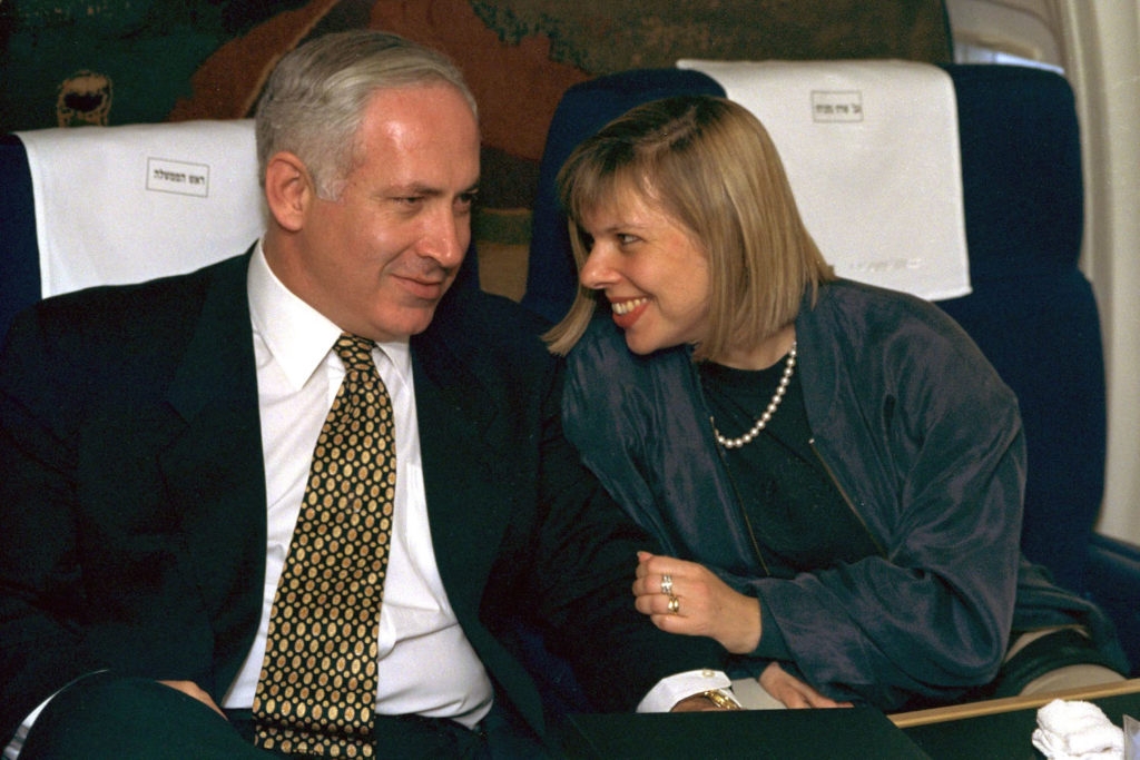 Prime Minister Benjamin Netanyahu with his wife Sara Netanyahu on board an Israeli Air Force jet, en route to a state visit to the United States July 9, 1996, soon after being elected prime minister. (Yaakov Saar/GPO via Getty Images)