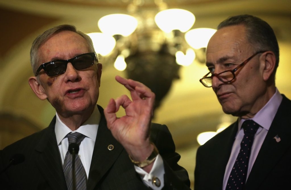 Senate Minority Leader Sen. Harry Reid (D-Nev), left, and Sen. Charles Schumer at a news briefing, Feb. 24, 2015. (Alex Wong/Getty Images)