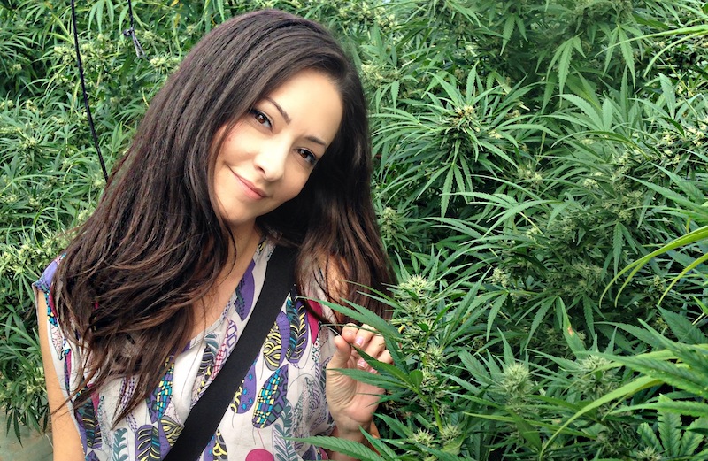 Dina Browner, the public face of the Los Angeles marijuana dispensary Alternative Herbal Health Services, posing with some of her wares.