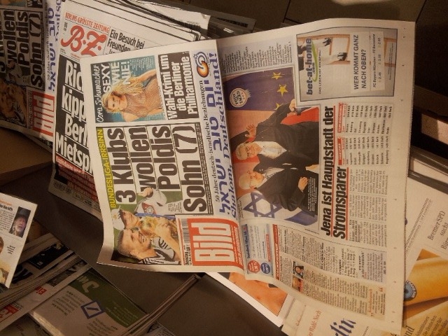 Germany's most read newspaper, Bild, featured a message in Hebrew and a photo of the German and Israeli presidents on its front page Tuesday. (Toby Axelrod)