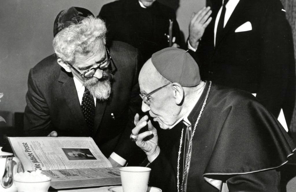 Rabbi Abraham Joshua Heschel meeting in New York with Cardinal Augustine Bea, who shepherded the process of Catholic introspection that led to Nostra Aetate, March 31, 1963. (American Jewish Committee)