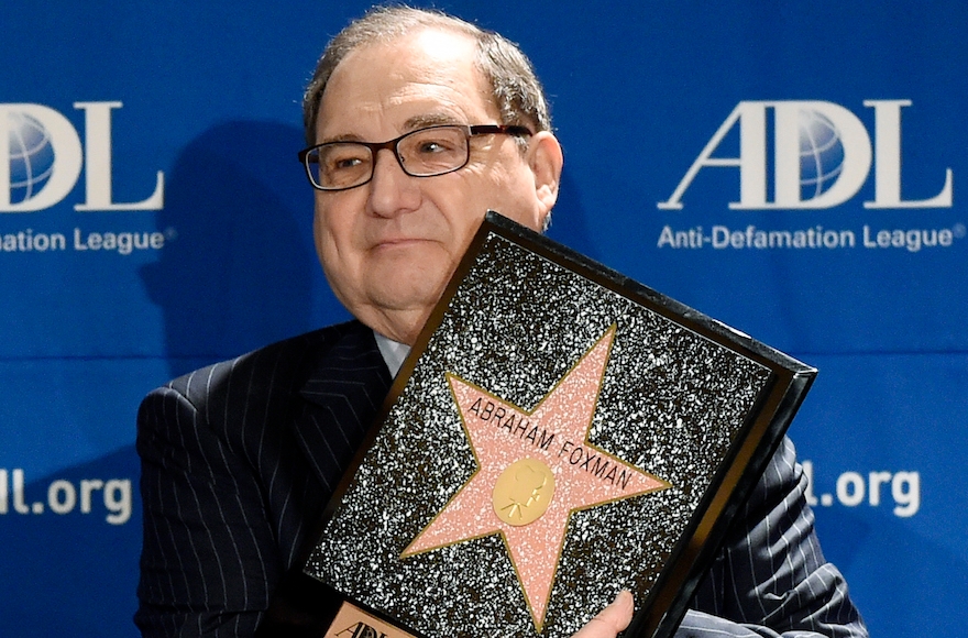 Abraham Foxman holds a replica of his Hollywood Walk of Fame Star as he is honored by the ADL's 2014 Annual Meeting at The Beverly Hilton in Beverly Hills, California, on November 7, 2014. (Kevork Djansezian/Getty Images)